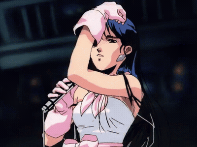 A Girl With Blue Hair Is Holding A Microphone GIF