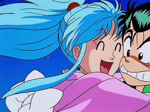 A Girl With Blue Hair Is Hugging A Boy GIF