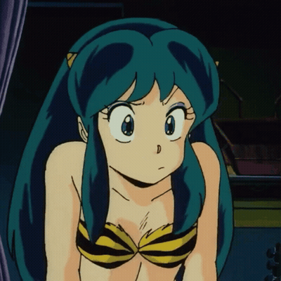 A Girl With Blue Hair Is Wearing A Yellow And Black Bikini Top GIF