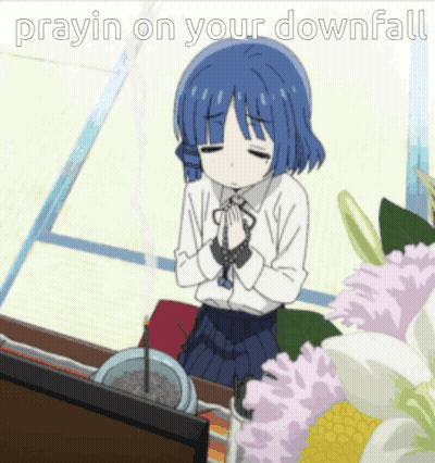 A Girl With Blue Hair Praying In Front Of Flowers With The Words Prayin On Your Downfall Above Her GIF