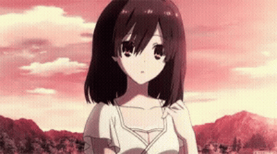 A Girl With Brown Hair And A White Shirt Is Standing In Front Of A Mountain . GIF
