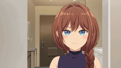 A Girl With Brown Hair And Blue Eyes Is Smiling In A Hallway GIF