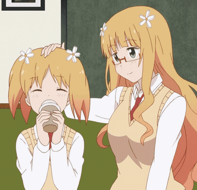 A Girl With Flowers In Her Hair Is Petting Another Girl 'S Hair GIF