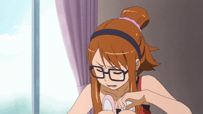 A Girl With Glasses And A Ponytail Is Looking Down GIF