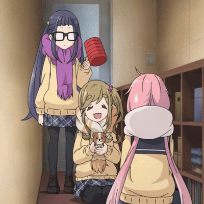 A Girl With Glasses Is Holding A Red Bucket GIF