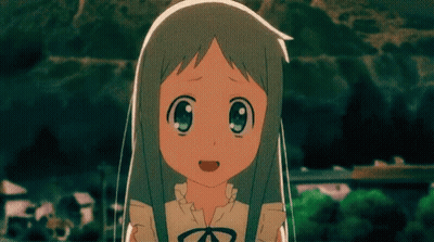 A Girl With Gray Hair And Blue Eyes Is Smiling And Looking At The Camera GIF