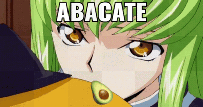 A Girl With Green Hair Is Holding An Avocado In Her Hand . GIF