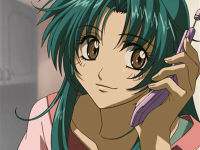A Girl With Green Hair Is Talking On A Cellphone GIF