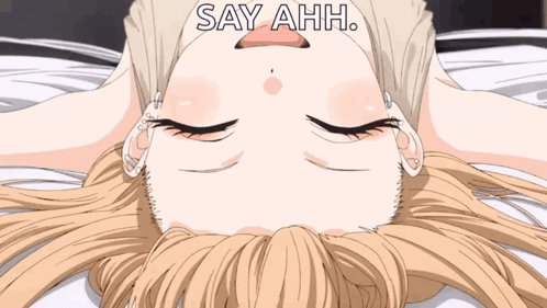 a girl with her eyes closed is laying on a bed with the words say ahh written above her