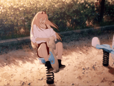 A Girl With Horns Is Sitting On A Seesaw In A Park GIF