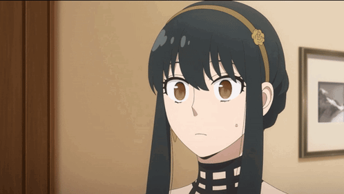 A Girl With Long Black Hair And A Headband With A Rose On It GIF