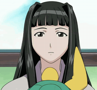 A Girl With Long Black Hair Is Holding A Yellow Object In Her Hand GIF