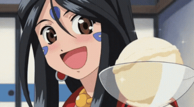 A Girl With Long Black Hair Is Smiling While Holding A Scoop Of Ice Cream GIF