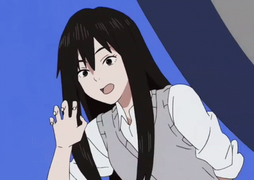 A Girl With Long Black Hair Is Wearing A White Shirt And A Gray Vest GIF