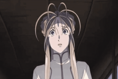 A Girl With Long Blonde Hair And Blue Eyes Looks Up At Something GIF