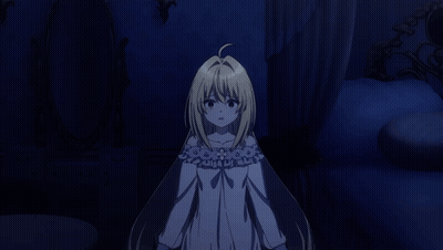 A Girl With Long Blonde Hair Is Standing In A Dark Room GIF