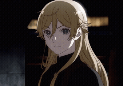 A Girl With Long Blonde Hair Is Wearing A Black Sweater GIF