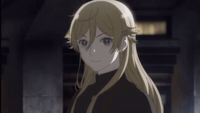 A Girl With Long Blonde Hair Is Wearing A Black Turtleneck GIF