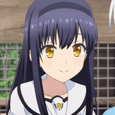A Girl With Long Blue Hair And Yellow Eyes Smiles For The Camera GIF