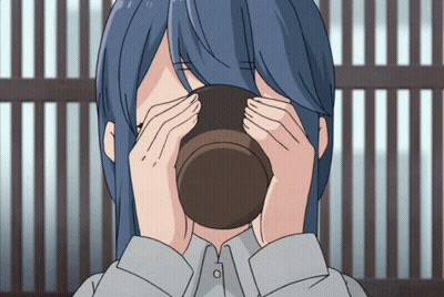 A Girl With Long Blue Hair Is Drinking From A Cup GIF