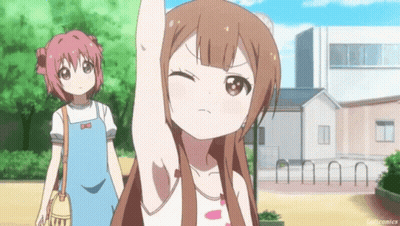 A Girl With Long Brown Hair Is Raising Her Arm In The Air While Another Girl Looks On GIF