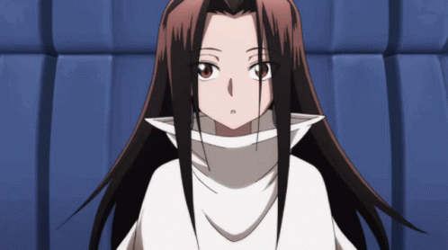 A Girl With Long Brown Hair Is Wearing A White Shirt GIF