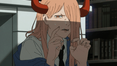 A Girl With Long Hair And Red Horns Is Making A Face GIF