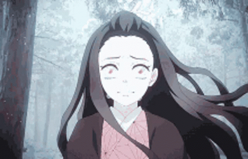 A Girl With Long Hair Is Walking Through A Forest . GIF