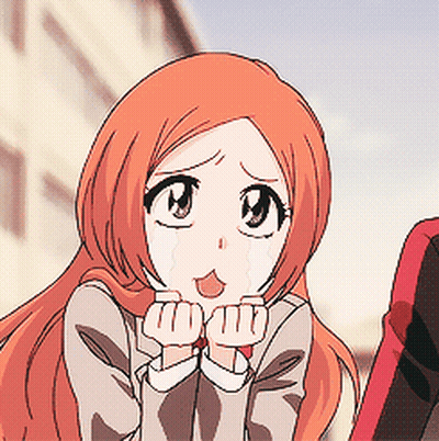 A Girl With Long Orange Hair Is Crying And Covering Her Mouth With Her Hands GIF