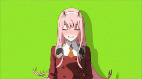 A Girl With Long Pink Hair And Horns Is Standing On A Green Background With Her Eyes Closed . GIF