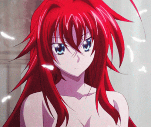 A Girl With Long Red Hair And Blue Eyes GIF