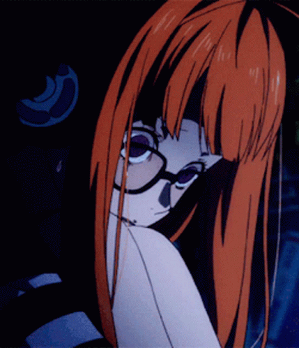 A Girl With Long Red Hair And Glasses Is Looking Over Her Shoulder GIF