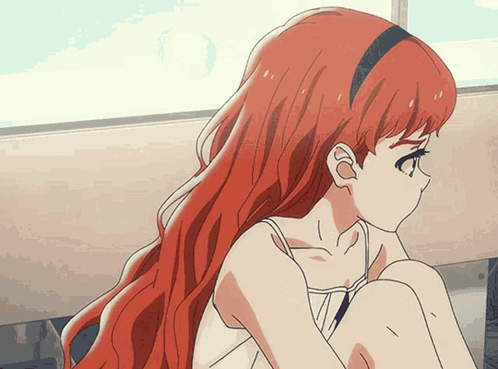 A Girl With Long Red Hair Is Sitting On A Bench GIF
