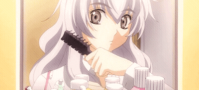 A Girl With Long White Hair Is Brushing Her Hair In Front Of A Mirror GIF