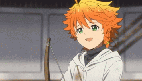 A Girl With Orange Hair And Green Eyes Is Smiling While Holding A Bow And Arrow GIF