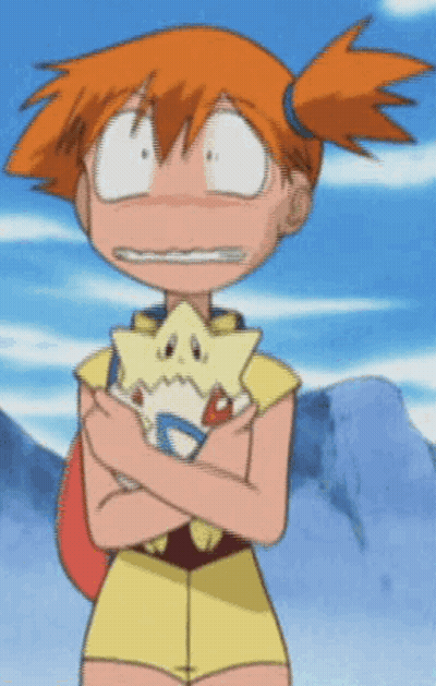 A Girl With Orange Hair Is Holding A Stuffed Animal With A Star On It GIF
