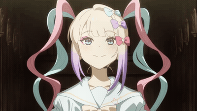 A Girl With Pigtails And A Bow In Her Hair Looks At The Camera GIF