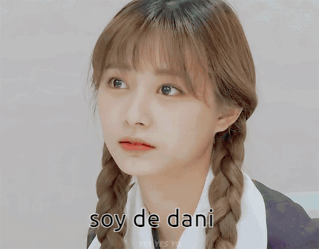 A Girl With Pigtails And The Words Soy De Dani Written On Her Face GIF