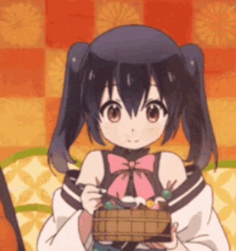 A Girl With Pigtails Is Holding A Basket Of Candy In Her Hand . GIF