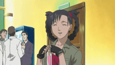 A Girl With Pigtails Is Smiling And Holding A Pink Item GIF