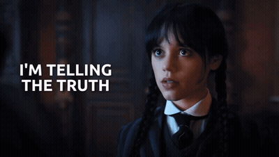 A Girl With Pigtails Says " I 'M Telling The Truth " In A Dark Room GIF