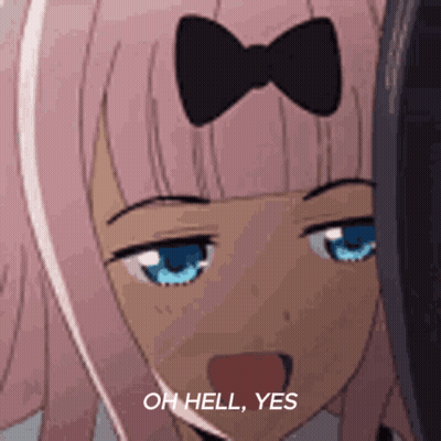 A Girl With Pink Hair And Blue Eyes Is Making A Funny Face . GIF