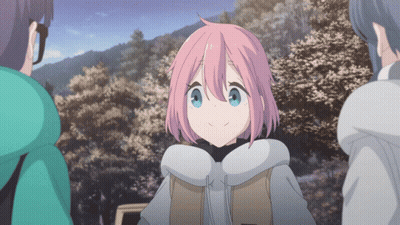 A Girl With Pink Hair And Blue Eyes Is Surrounded By Other Girls GIF