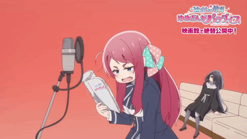 A Girl With Pink Hair And Blue Eyes Stands In Front Of A Microphone With A Bow In Her Hair GIF
