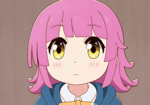 A Girl With Pink Hair And Yellow Eyes Is Looking At The Camera GIF