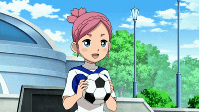 A Girl With Pink Hair Holding A Soccer Ball GIF