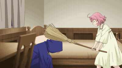 A Girl With Pink Hair Is Holding A Broom In A Bedroom GIF