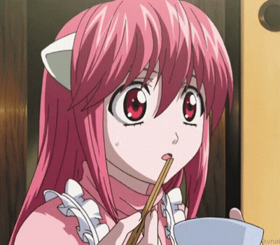 A Girl With Pink Hair Is Holding Chopsticks In Her Mouth GIF