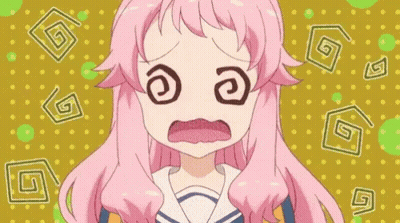 A Girl With Pink Hair Is Making A Funny Face With Her Eyes Closed . GIF