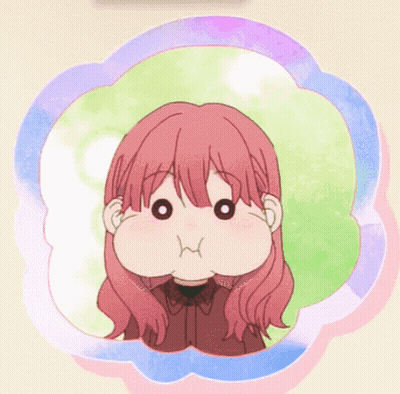 A Girl With Pink Hair Is Making A Funny Face GIF